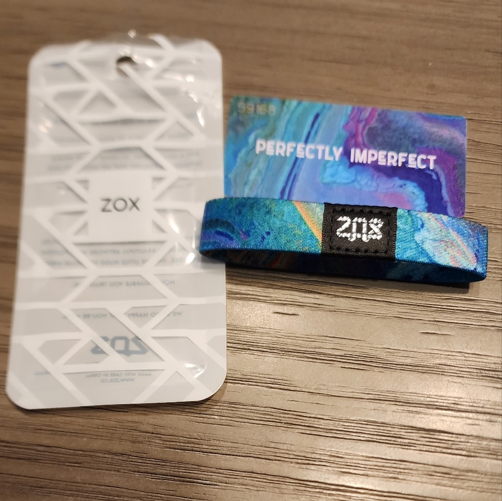 Zox brand braclet that says perfectly imperfect